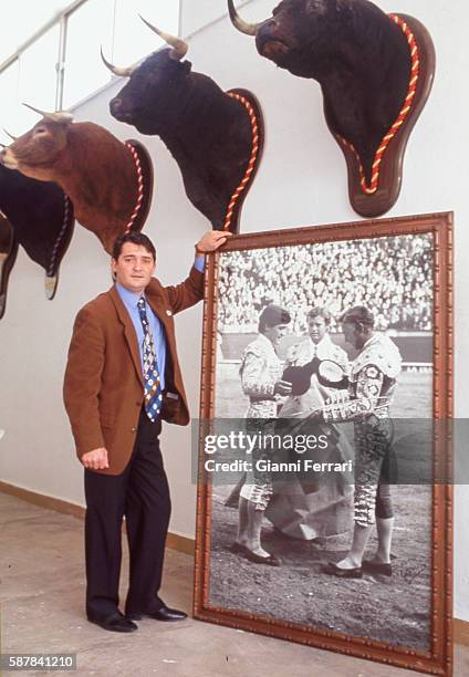 The Spanish bullfighter Vicente Ruiz 'El Soro' with some trophies at his home in Foyos Valencia, Spain. .