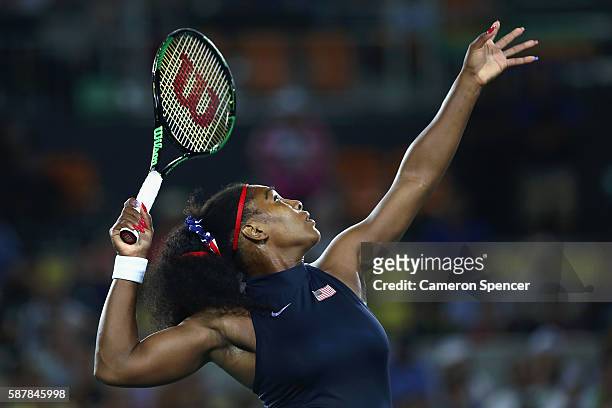 Serena Williams of the United States serves against Elina Svitolina of Ukraine during a Women's Singles Third Round match on Day 4 of the Rio 2016...