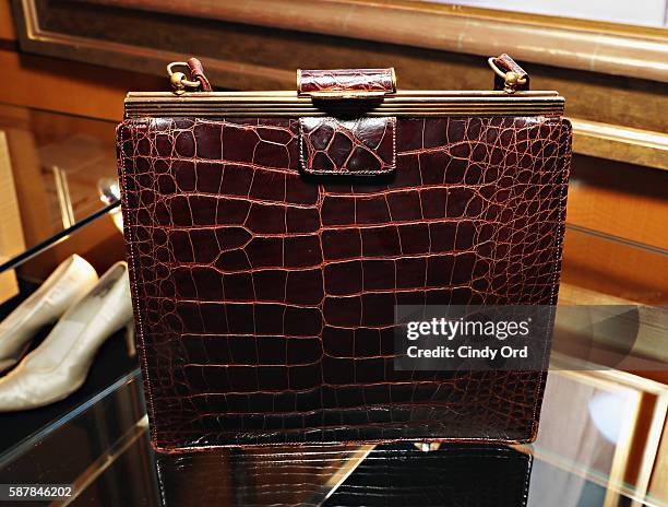 An L. Magnum & Co chocolate brown 1950s alligator handbag once owned by Marilyn Monroe on display as Julien's Auctions shows select,...