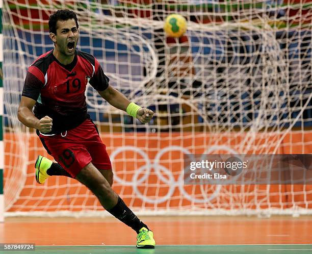 Mohamed Elbassiouny of Egypt celebrates after he scored the game winning goal in the final seconds of the game against Sweden on Day 4 of the Rio...