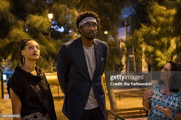 Amar'e Stoudemire and his wife seen during a contemporary art exhibition at Ana Tiho center on August 9, 2016 in Jerusalem, Israel. Stoudemire, who...