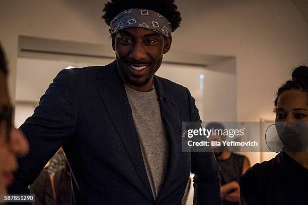 Amar'e Stoudemire and his wife seen during a contemporary art exhibition at Ana Tiho center on August 9, 2016 in Jerusalem, Israel. Stoudemire, who...
