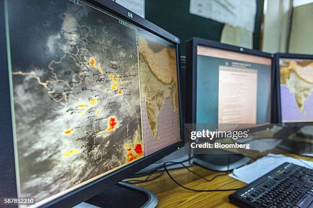 Monitor displays weather conditions in the meteorological department of the air traffic control services office at Indira Gandhi International...