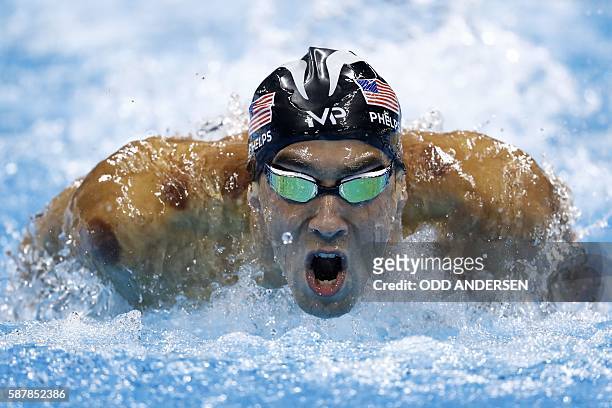 S Michael Phelps competes in the Men's 200m Butterfly Final during the swimming event at the Rio 2016 Olympic Games at the Olympic Aquatics Stadium...