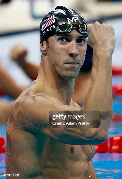 Michael Phelps of the United States celebrates winning gold in the Men's 200m Butterfly Final on Day 4 of the Rio 2016 Olympic Games at the Olympic...