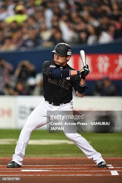 Outfielder Yoshihiro Maru of Japan bats during the international friendly match between Japan and Chinese Taipei at the Kyocera Dome Osaka on March...