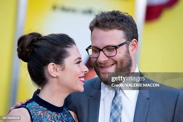 Actress Lauren Miller and writer/producer/actor Seth Rogen attend the world premiere of "Sausage Party" in Westwood, California, on August 9, 2016. /...