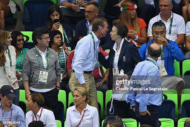 Henri Grand Duke of Luxembourg kisses with Princess Anne during women's 200m Individual medley on Day 4 of the Rio 2016 Olympic Games at the Olympic...