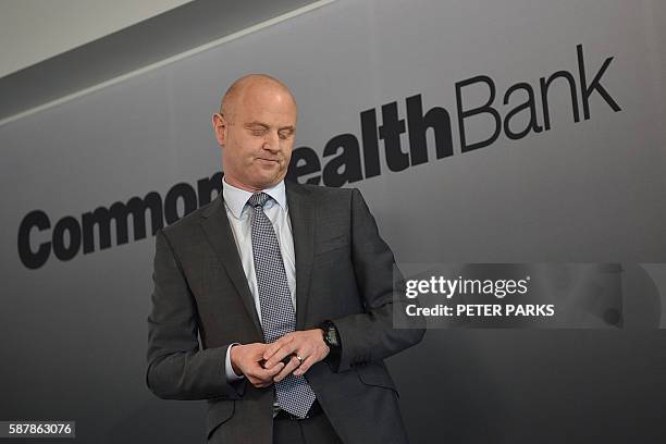 Commonwealth Bank chief executive Ian Narev gestures as he announces the banks annual results in Sydney on August 10, 2016. Australia's biggest bank,...