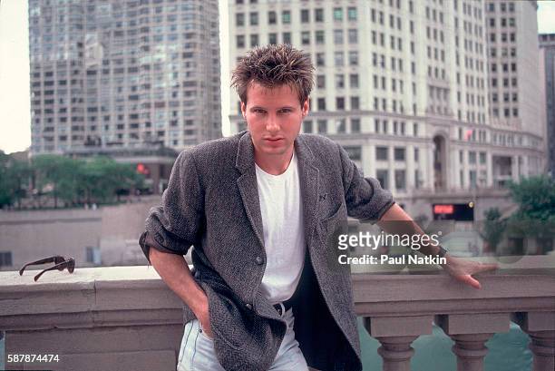 Portrait of singer Corey Hart on the street in Chicago, Illinois, June 12, 1984.