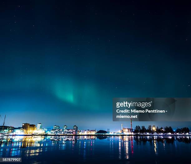 northern lights (aurora borealis) above helsinki - helsinki stock pictures, royalty-free photos & images