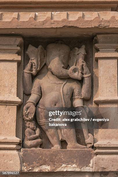 ganesha sculpture in indian temple - khajuraho statues stock pictures, royalty-free photos & images