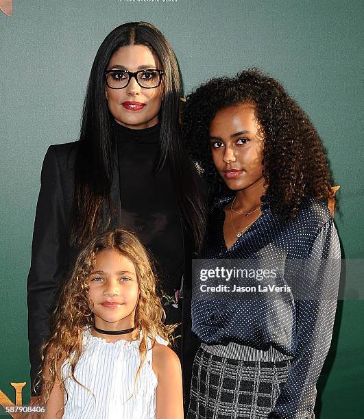 Designer Rachel Roy and daughters Tallulah Ruth Dash and Ava Dash attend the premiere of "Pete's Dragon" at the El Capitan Theatre on August 8, 2016...