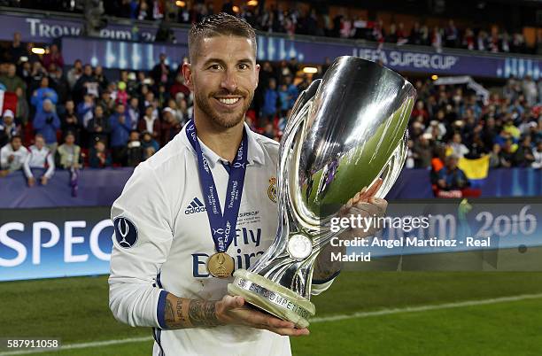 Sergio Ramos of Real Madrid celebrates with the trophy after the UEFA Super Cup match between Real Madrid and Sevilla at Lerkendal Stadion on August...