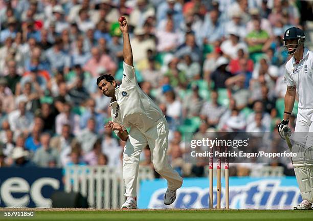 Singh bowling for India during the 4th Test match between England and India at The Oval, London, 19th August 2011. The England batsman is Kevin...