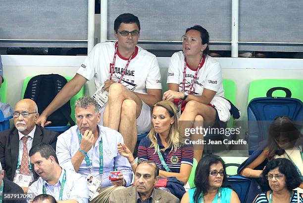 Alexander Popov and his wife Darya Popova attend the swimming finals on day 4 of the Rio 2016 Olympic Games at Olympic Aquatics Stadium on August 9,...