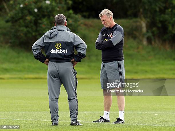 Sunderland manager David Moyes chats with assistant manager Paul Bracewell during a Sunderland AFC training session at The Academy of Light on August...
