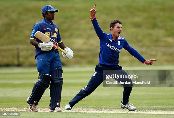 Max Holden of England celebrates getting the wicket of Wanidu Hasaranga of Sri Lanka during the Royal London One-Day Series match between England U19...