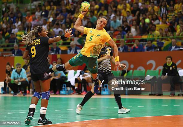 Marta Gonzalez Mangue of Spain challenges Daniela Piedade of Brazil during the Womens Preliminary Group A match between Brazil and Spain at Future...