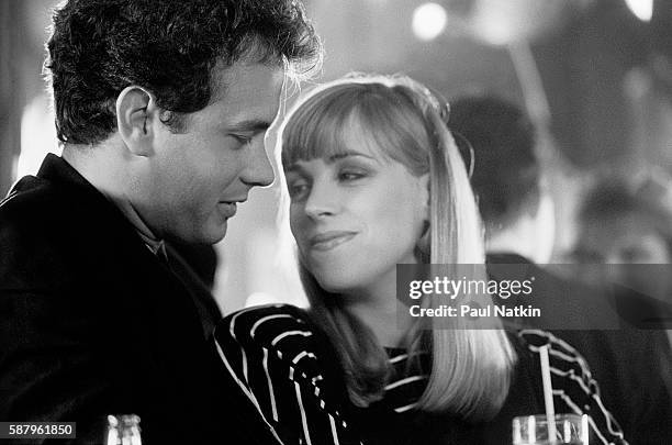 Actor Tom Hanks and actress Bess Armstrong on the set of the Thompson Twins music video for the theme song of the movie 'Nothing In Common,' Chicago,...