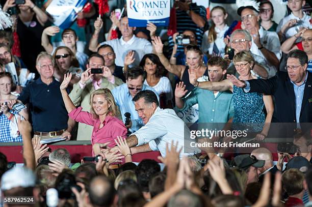 Republican presidential nominee Mitt Romney campaigning with his wife Anne Romney at a campaign rally at Holman Stadium in Nashua, NH on September 7,...