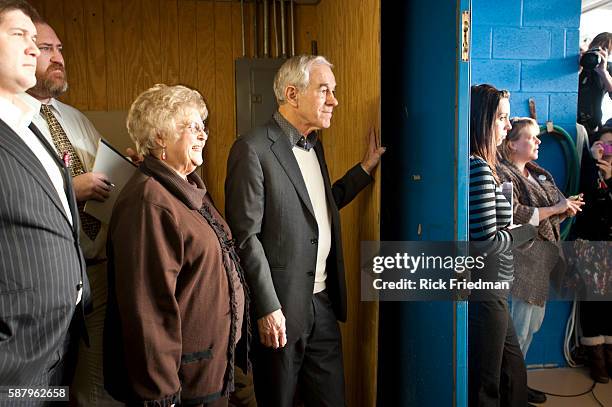 Republican presidential candidate Congressman Ron Paul with his wife Carol Paul waiting to be introduced at a campaign rally at Nashua Airport in...