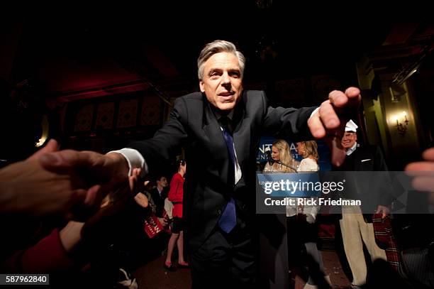 Republican presidential candidate Jon Huntsman celebrates his third place finish in the NH primary with his wife Mary Kaye Huntsman on NH Primary...