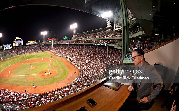 John Henry, principal owner of the Red Sox in the owner's box, watching the final regular season home game between the Boston Red Sox and the...