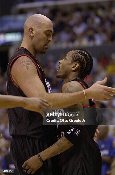 Matt Geiger and Allen Iverson of the Philadelphia 76ers in game one of the NBA Finals against the Los Angeles Lakers at Staples Center in Los...