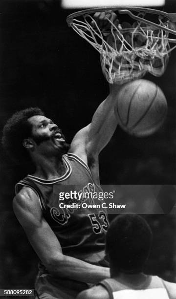 Artis Gilmire of the Chicago Bulls circa 1982 dunks against the Washington Bullets at the Capital Centre in Landover, Maryland.
