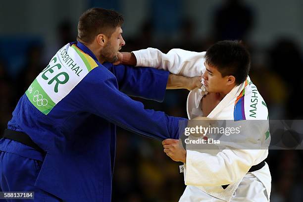 Marc Odenthal of Germany competes against Mashu Baker of Japan during a Men's-90kg bout on Day 5 of the Rio 2016 Olympic Games at Carioca Arena 2 on...