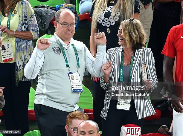 Prince Albert II of Monaco dancing in the stands, Nadia Comaneci laughing attend the women's team final in Artistic Gymnastics at Rio Olympic Arena...