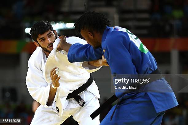 Avtar Singh of India competes against Popole Misenga of the Refugee Olympic Team during a Men's -90kg bout on Day 5 of the Rio 2016 Olympic Games at...