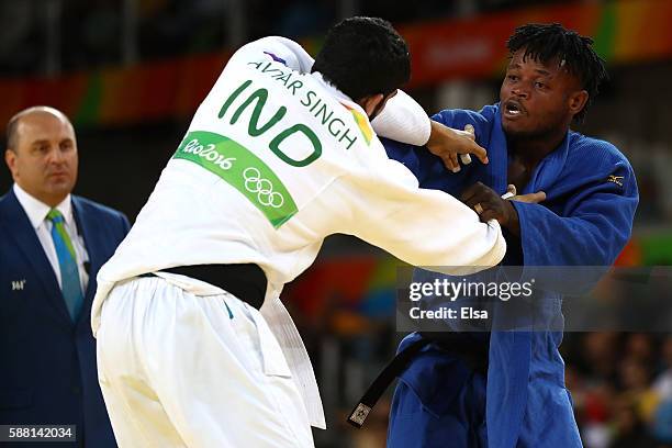 Avtar Singh of India competes against Popole Misenga of the Refugee Olympic Team during a Men's -90kg bout on Day 5 of the Rio 2016 Olympic Games at...