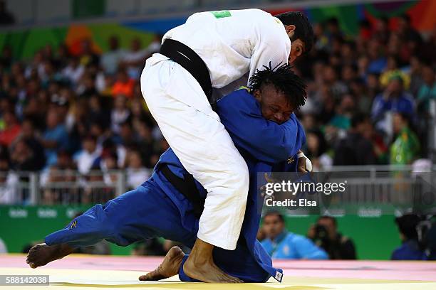 Avtar Singh of India competes against Popole Misenga of the Refugee Olympic Team during a Men's -90kg bout on Day 5 of the Rio 2016 Olympic Games at...