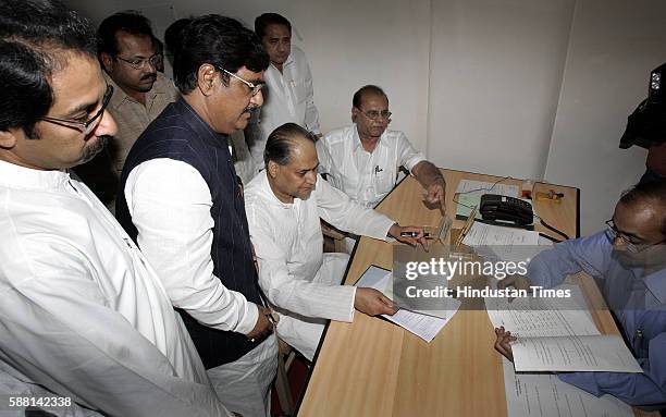 Rajya Sabha Elections - Rahul Bajaj filing his nomination papers for Rajya Sabha seat at Vidhan Bhavan as Uddhav Thackeray, Gopinath Munde and Madan...