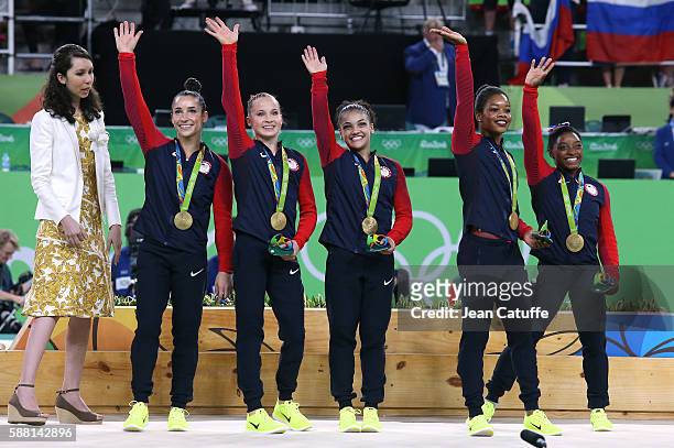 Gold medalists Alexandra Raisman, Madison Kocian, Lauren Hernandez, Gabrielle Douglas and Simone Biles of the United States pose during the medal...