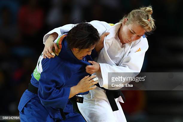 Kim Polling of the Netherlands competes against Haruka Tachimoto of Japan during a Women's -70kg bout on Day 5 of the Rio 2016 Olympic Games at...