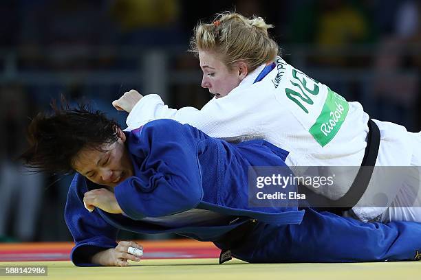 Kim Polling of the Netherlands competes against Haruka Tachimoto of Japan during a Women's -70kg bout on Day 5 of the Rio 2016 Olympic Games at...