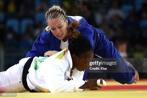 Sally Conway of Great Britain competes against Gevrise Emane of France during a Women's -70kg bout on Day 5 of the Rio 2016 Olympic Games at Carioca...