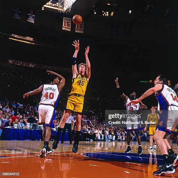 Rik Smits of the Indiana Pacers shoots the ball against the New York Knicks during the Eastern Conferece Finals on June 4, 1999 at Madison Square...