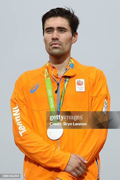 Silver medalist Tom Dumoulin of the Netherlands stands on the podium at the medal ceremony for the Cycling Road Men's Individual Time Trial on Day 5...