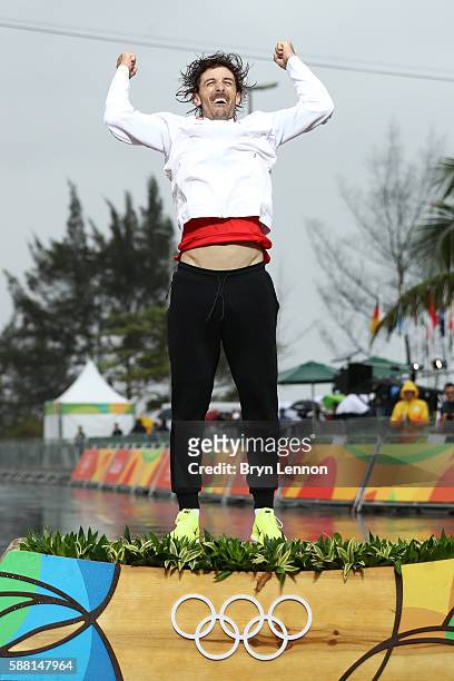 Gold medalist Fabian Cancellara of Switzerland celebrates on the podium at the medal ceremony for the Cycling Road Men's Individual Time Trial on Day...