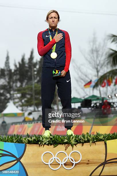 Gold medalist Kristin Armstrong of the United States celebrates on the podium at the medal ceremony for the Cycling Road Women's Individual Time...