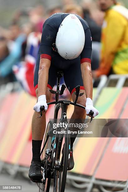 Christopher Froome of Great Britain crosses the finish line in the Cycling Road Men's Individual Time Trial on Day 5 of the Rio 2016 Olympic Games at...