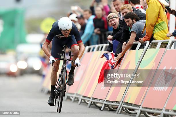 Christopher Froome of Great Britain crosses the finish line in the Cycling Road Men's Individual Time Trial on Day 5 of the Rio 2016 Olympic Games at...