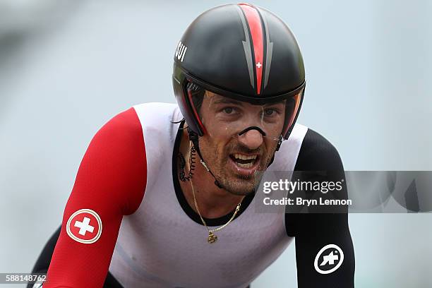 Fabian Cancellara of Switzerland crosses the finish line in the Cycling Road Men's Individual Time Trial on Day 5 of the Rio 2016 Olympic Games at...