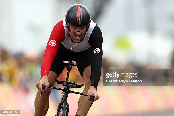 Fabian Cancellara of Switzerland crosses the finish line in the Cycling Road Men's Individual Time Trial on Day 5 of the Rio 2016 Olympic Games at...