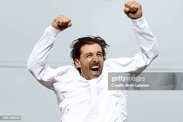 Gold medalist Fabian Cancellara of Switzerland celebrates on the podium at the medal ceremony for the Cycling Road Men's Individual Time Trial on Day...