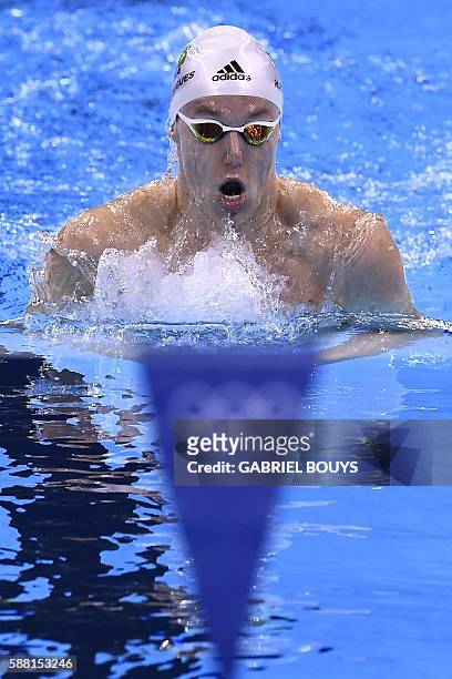 Brazil's Henrique Rodrigues competes in a Men's 200m Individual Medley heat during the swimming event at the Rio 2016 Olympic Games at the Olympic...